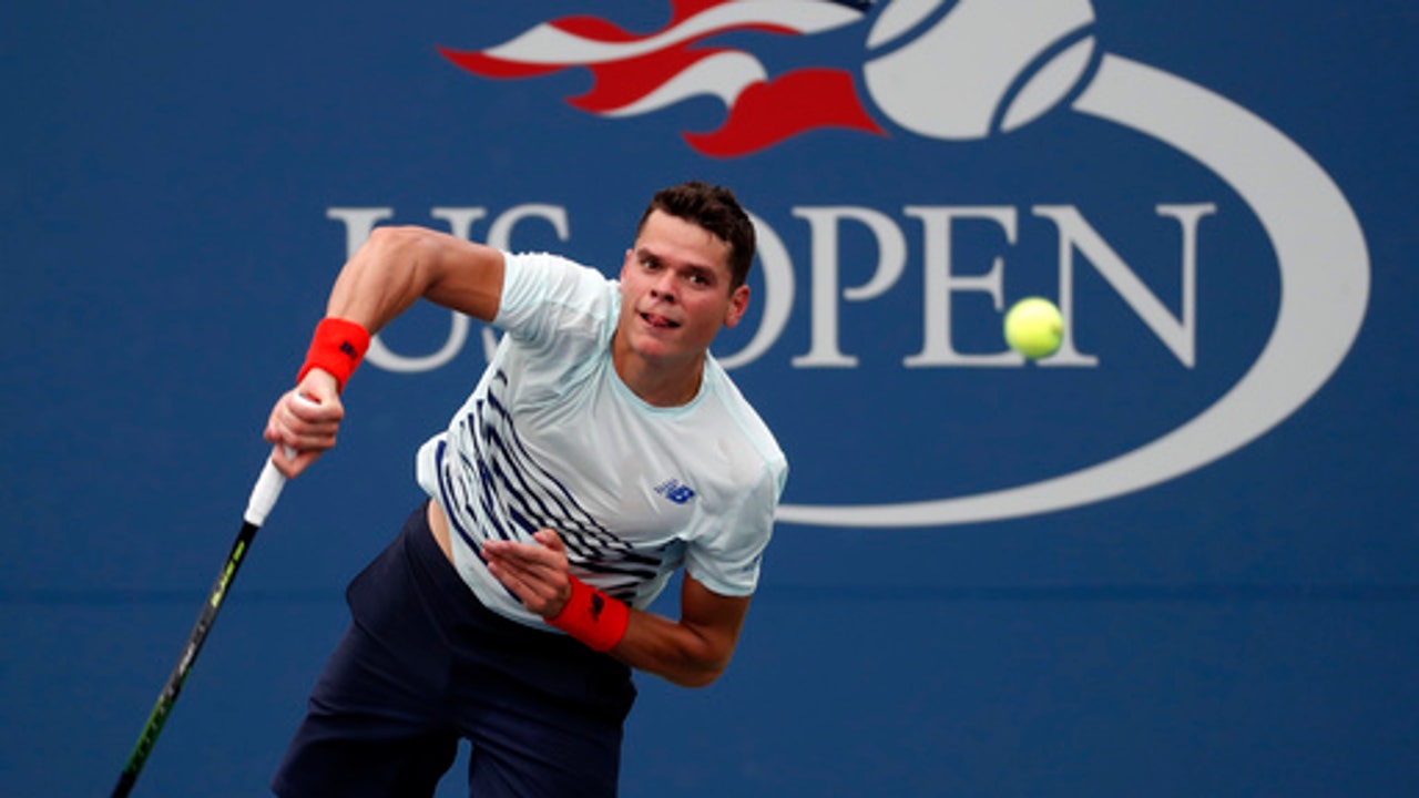 The Latest: Raonic stunned by 120th-ranked qualifier from US